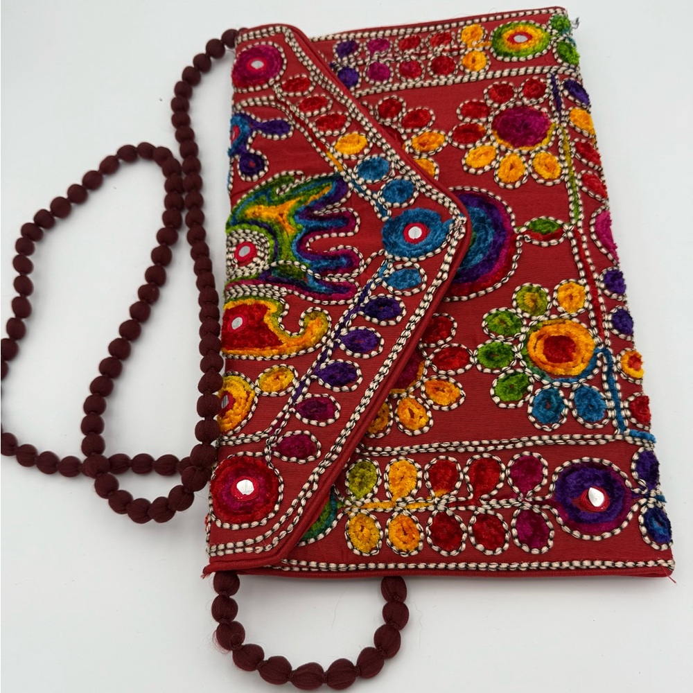 Nice fall color: Beautiful hand-embroidered women’s clutch with strap